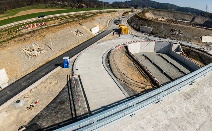 Drone footage of the major infrastructure construction site in G Glattfelden, Switzerland, 22nd Mar 2026: Drone footage of the major construction site at the Chrüzstrasse roundabout. The expansion of Schaffhauserstrasse in the Zurich lowlands shows the current construction progress and the future traffic flow from above. *** Drone footage of the major infrastructure construction site in G Glattfelden, Switzerland, March 22, 2026. Drone footage of the major construction site at the Chrüzstrasse roundabout. The expansion of Schaffhauserstrasse in the Zurich lowlands shows the current construction progress and the future traffic flow from above.,detected_source_language Copyright: xAndreasxHaasx