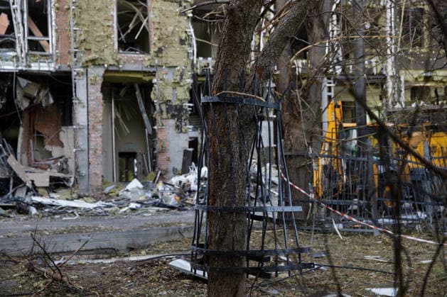 Volunteers Remove Debris at Dovzhenko Film Studio in Kyiv An iron fence ripped out of the ground by the shockwave from the Russian strike is wrapped around a nearby tree at the Oleksandr Dovzhenko National Film Studio, Kyiv, Ukraine, June 19, 2026. The studio sustained considerable damage during the large-scale Russian missile and drone attack on the capital on June 15. The costume shop, which housed the largest and oldest costume collection in Ukraine, suffered the most destruction. Its storage contained around 100,000 costumes created for films across different decades, as well as approximately three million pieces of props. Other buildings of the film studio were also damaged. Photo by Marianna Kotyk Ukrinform ABACAPRESS.COM Kyiv Ukrai  Copyright: xUkrinform ABACAx