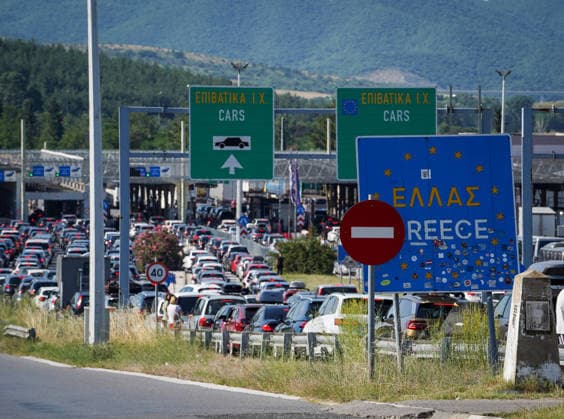 Schengen Entry Exit System North Macedonia and Greece border GEVGELIJA, NORTH MACEDONIA - JUNE 20: A view of the kilometer-long queues of vehicles heading toward Greece at the Evzoni border crossing in Gevgelija, North Macedonia on June 20, 2026. Travelers face hours-long delays amid heavy summer traffic and the implementation of the new Schengen Entry Exit System (EES), which requires the collection of biometric data from passengers. Nake Batev Anadolu Gevgelija North Macedonia. Editorial use only. Please get in touch for any other usage.  Copyright: x2026xAnadoluxNakexBatevx