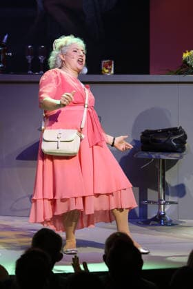 Eva Brunner on stage at the premiere of the comedy Höchste Zeit, Winterhuder Fährhaus Comedy. This musical comedy, featuring hits from the ’70s through the ’90s, follows four women going through menopause who, on the eve of a wedding, grapple with the big questions about love, marriage, and the perfect partner, Hamburg, June 19, 2026,detected_source_language