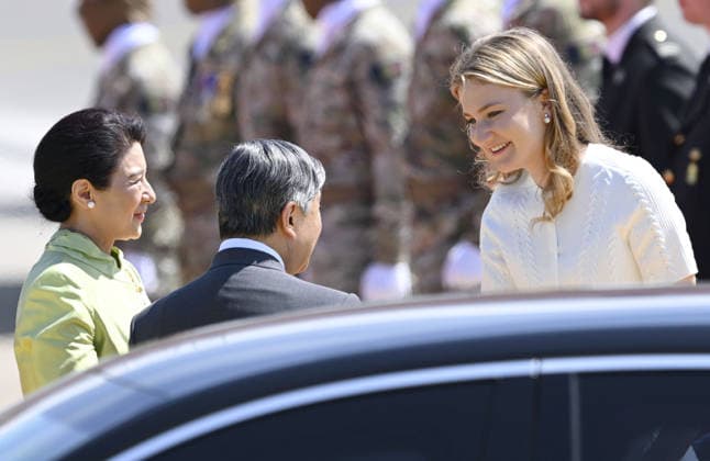Japan s imperial couple arrive in Belgium Japan s Emperor Naruhito and Empress Masako are greeted by Belgium s Crown Princess Elisabeth (R) upon arriving at Melsbroek Air Base near Brussels on June 20, 2026, on the second leg of their official trip to the Netherlands and Belgium. (Pool photo)  A14AA0005619547P