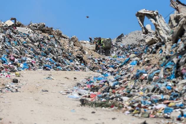 Displaced Families Endure Harsh Conditions in Bureij Refugee Camp GAZA STRIP JUNE 2026: Displaced Palestinians live in difficult conditions beside piles of accumulated waste in Bureij refugee camp. Children search through discarded materials in an attempt to find items that can help support their families amid worsening humanitarian conditions and limited access to basic necessities. BUREIJ PS Copyright: x xRamzixAbuxAmerx xJNAxPressx