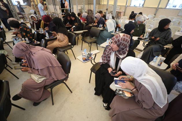 Palestinian Student Sits for Tawjihi Exam in Gaza Dana Mohammed Abu Thalfa, a Palestinian high school student, sits for the General Secondary Education Certificate Examination (Tawjihi) in the Gaza Strip, on June 20, 2026. Thousands of students across the Gaza Strip are taking the nationwide exams despite the ongoing humanitarian crisis, challenging living conditions and limited educational resources. Hassan Jedi apaimages Nusairat Gaza Strip Palestinian Territory 200626_Nusairat_HJ_00(28).jpeg Copyright: xapaimagesxHassanxJedix xapaimagesx