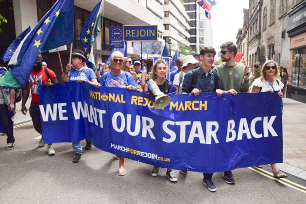 June 20, 2026, London, England, United Kingdom: Protesters pass through Central London during the National Rejoin March, calling on the UK government to rejoin the European Union on the tenth anniversary of the Brexit referendum. London United Kingdom  - ZUMAv130 20260620_zip_v130_058 Copyright: xVukxValcicx