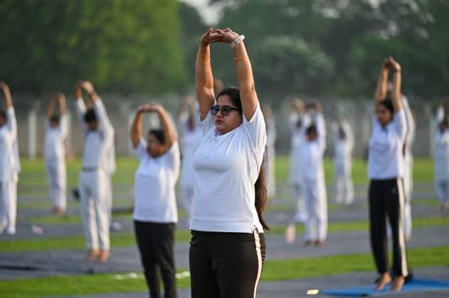 GURUGRAM, INDIA - JUNE 20: People perform yoga during the Yoga Protocol rehearsal ahead of the 12th International Day of Yoga at Tau Devi Lal Stadium, sector-38 near Rajiv Chowk, on June 20, 2026 in Gurugram, India. (Photo by Parveen Kumar Hindustan Times ) Yoga Protocol Rehearsal Ahead Of 12th International Day Of Yoga At Tau Devi Lal Stadium