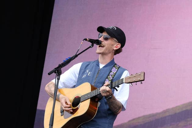 June 20, 2026, Newport, United Kingdom: Scottish singer songwriter Nathan Evans born Nathan Alexander Evans, performing live on stage with The Saint PHNX Band at the Isle of Wight festival. He first gained fame in 2020 by posting videos of himself singing sea shanties on TikTok. In 2021, he released a version of the folk song Wellerman which peaked at the top of the UK Singles Chart. The Saint PHNX Band is currently Nathan Evans Lead vocals and acoustic guitar., Stevie Jukes Lead vocals, guitar, and bass, Alan Jukes Backing vocals, drums, and percussion Newport United Kingdom - ZUMAs197 20260620_aaa_s197_167 Copyright: xDawnxFletcher-Parkx