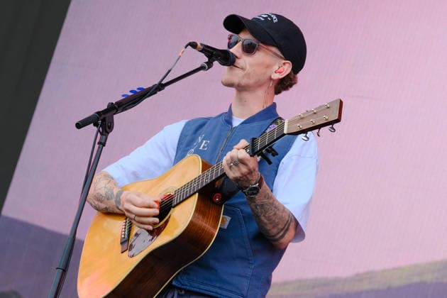 June 20, 2026, Newport, United Kingdom: Scottish singer songwriter Nathan Evans born Nathan Alexander Evans, performing live on stage with The Saint PHNX Band at the Isle of Wight festival. He first gained fame in 2020 by posting videos of himself singing sea shanties on TikTok. In 2021, he released a version of the folk song Wellerman which peaked at the top of the UK Singles Chart. The Saint PHNX Band is currently Nathan Evans Lead vocals and acoustic guitar., Stevie Jukes Lead vocals, guitar, and bass, Alan Jukes Backing vocals, drums, and percussion Newport United Kingdom - ZUMAs197 20260620_aaa_s197_168 Copyright: xDawnxFletcher-Parkx