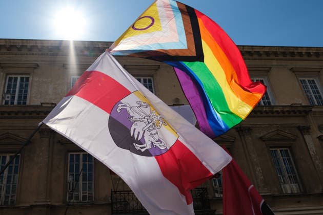June 20, 2026, Warsaw, Masovian Voivodeship, Poland: A rainbow pride flag and Belarusian white-red-white flag with added non-binary colors wave in the air during Warsaw s first ever radical Pride parade. Called Equality Parade - Queer Liberation March in Polish, the grassroots march was organized by a collective of radical LGBTQ+ activists as an anti-capitalist alternative to Warsaw s traditional Pride parade, which has recently become dominated by corporate sponsors. Warsaw Poland - ZUMAk204 20260620_zip_k204_013 Copyright: xRomanxKozielx