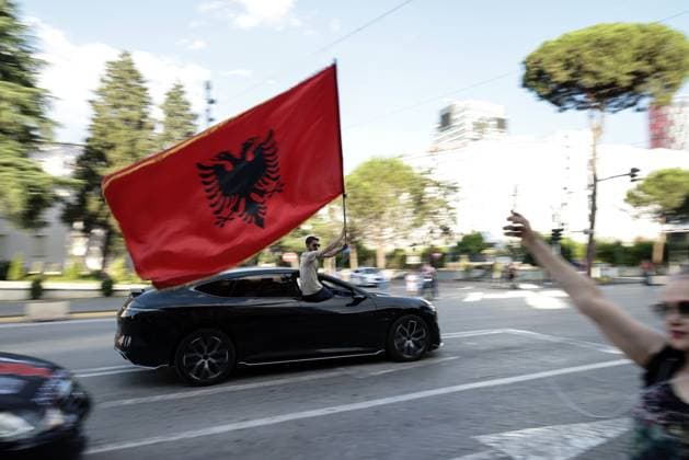 Thousands Gather in Tirana for Day 21 of Anti-Kushner Protests TIRANA, ALBANIA JUNE 20, 2026: Thousands of demonstrators gather in central Tirana during the twenty-first consecutive day of protests against a proposed luxury tourism development project linked to Jared Kushner. The rally drew one of the largest crowds since the movement began in late May, including members of the Albanian diaspora who traveled from across Europe and beyond to take part. Protesters marched through the capital carrying banners, placards, and Albanian flags while calling for the cancellation of the project and expressing concerns over its potential environmental impact on protected coastal areas. Tirana Albania Copyright: x xVlasovxSulajx xJNAxPressx