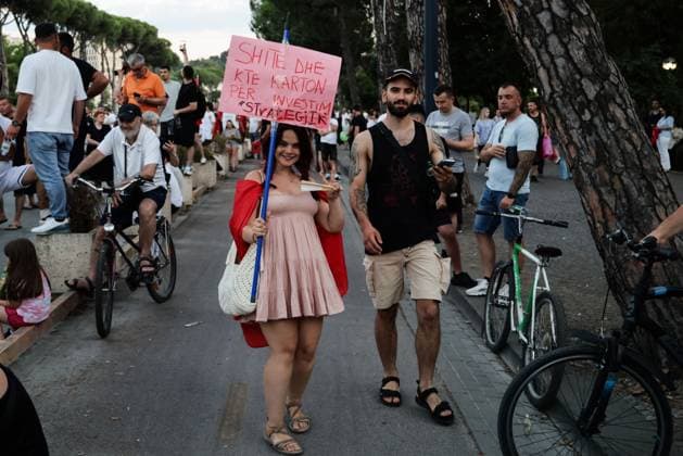 Thousands Gather in Tirana for Day 21 of Anti-Kushner Protests TIRANA, ALBANIA JUNE 20, 2026: Thousands of demonstrators gather in central Tirana during the twenty-first consecutive day of protests against a proposed luxury tourism development project linked to Jared Kushner. The rally drew one of the largest crowds since the movement began in late May, including members of the Albanian diaspora who traveled from across Europe and beyond to take part. Protesters marched through the capital carrying banners, placards, and Albanian flags while calling for the cancellation of the project and expressing concerns over its potential environmental impact on protected coastal areas. Tirana Albania Copyright: x xVlasovxSulajx xJNAxPressx