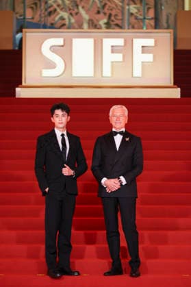 SHANGHAI, CHINA - JUNE 20: Actor Leo Wu Lei (L) arrives at the red carpet of the closing ceremony for the 28th Shanghai International Film Festival on June 20, 2026 in Shanghai, China.  Copyright: xVCGx 111649392995