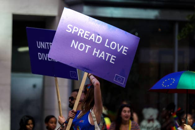 June 20, 2026, Washington, District Of Columbia, USA: A representative of the European Union (EU) carries a sign reading spread love, not hate during the 2026 Capital Pride Parade in Washington, D.C. on June 20, 2026. Washington USA - ZUMAd227 20260620_znp_d227_027 Copyright: xBryanxDozierx
