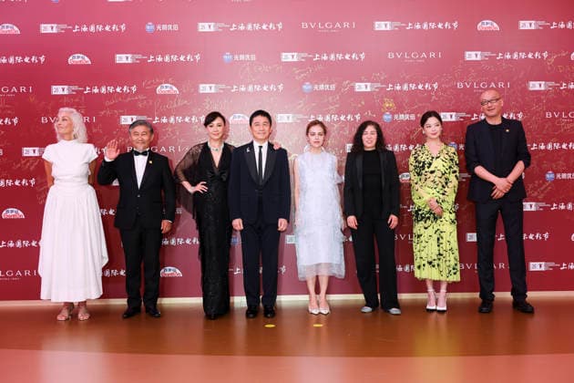 SHANGHAI, CHINA - JUNE 20: Jury members actor Tony Leung Chiu-wai and his wife Carina Lau Kar-ling, producer Dora Bouchoucha Fourati, director Guan Hu, director Aktan Abdykalykov, director-screenwriter Dea Kulumbegashvili, screenwriter Fernanda Valadez and actress Xin Zhilei arrive at the red carpet of the closing ceremony for the 28th Shanghai International Film Festival on June 20, 2026 in Shanghai, China.  Copyright: xVCGx 111649394740