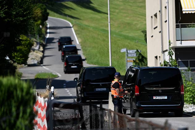 (260621) -- BURGENSTOCK, June 21, 2026 -- A police officer stands guard at the entrance to the road leading to a hotel complex in Burgenstock near Lucerne, Switzerland, June 20, 2026. Switzerland on Saturday said that it continues to provide a discreet and reliable setting to facilitate talks at the central Swiss resort of Burgenstock on the implementation of the Memorandum of Understanding between the United States and Iran. ) SWITZERLAND-BURGENSTOCK-U.S.-IRAN TALKS-RELIABLE SETTING LianxYi 