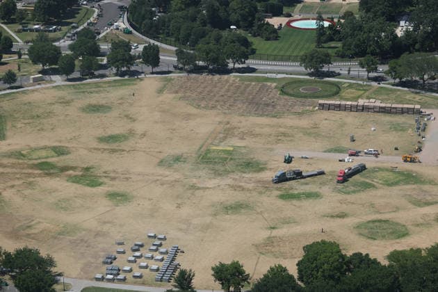 WASHINGTON, D.C. - JUNE 20: Workers clean the DC Ellipse lawn after the UFC Freedom 250 event on June 20, 2026 in Washington D.C. Copyright: xmpi34x