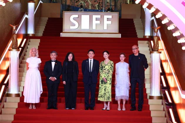 SHANGHAI, CHINA - JUNE 20: Actor Tony Leung Chiu-wai and actress Xin Zhilei arrive at the red carpet of the closing ceremony for the 28th Shanghai International Film Festival on June 20, 2026 in Shanghai, China.  Copyright: xVCGx 111649518336