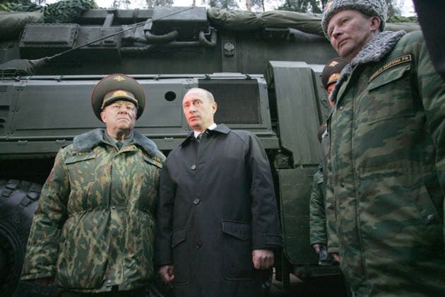 Vladimir Putin Vladimir Putin visited base of russian strategic rocket forces in Teikovo of Inanovo Region.Defence Minister Sergei Ivanov(r)and Commander in Chief of Strategic Rocket Forces general Nikolai Solovtsov(l). Copyright: xPhotoXPressx