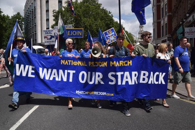 June 20, 2026, London, England, United Kingdom: Protesters pass through Central London during the National Rejoin March, calling on the UK government to rejoin the European Union on the tenth anniversary of the Brexit referendum. London United Kingdom - ZUMAv130 20260620_zip_v130_069 Copyright: xVukxValcicx