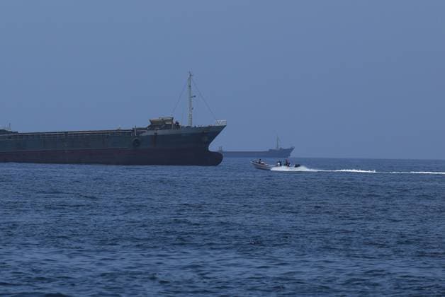Commercial ships and oil tankers in Gulf of Oman ahead of Hormuz reopening MUSCAT, OMAN - JUNE 21: A view of commercial cargo vessels and crude oil tankers are anchored in the Gulf of Oman, off the coast of Muscat, Oman, on June 21, 2026, as they prepare to transit through the critical Strait of Hormuz. Maritime traffic along this vital global trade corridor experienced severe disruptions following heightened geopolitical tensions between the United States and Iran that escalated earlier in February. Following a diplomatic memorandum of understanding reached in mid-June, the strategic waterway is expected to fully reopen to international shipping and energy transit. Shady Alassar Anadolu Muscat Oman. Editorial use only. Please get in touc  Copyright: x2026xAnadoluxShadyxAlassarx