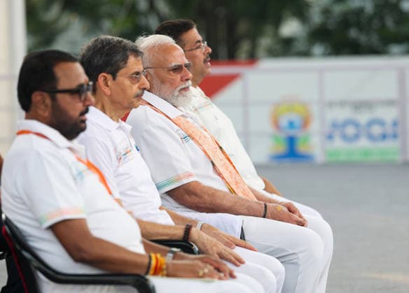 PM Modi takes part in 12th International Day of Yoga celebrations Kolkata, Jun 21 (ANI): Prime Minister Narendra Modi during the 12th International Day of Yoga celebrations, in Kolkata on Sunday. West Bengal Governor R.N. Ravi, Chief Minister Suvendu Adhikari and Union MoS (I C) Prataprao Ganpatrao Jadhav also present. (DPR PMO ANI Photo) Kolkata West Bengal India Copyright: xANIx ANI_20260621016