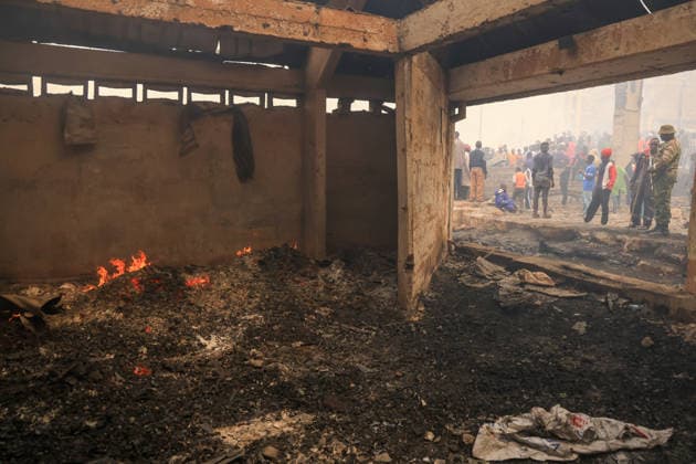 Blaze destroys shops at Nairobi s Gikomba Market NAIROBI, KENYA - JUNE 21: A view of burning stucture as people inspect the damage and try to salvage their belongings after a fire broke out at Gikomba Market in Nairobi, Kenya, on June 21, 2026. Numerous shops were destroyed in the blaze as firefighters worked to contain the fire. Lucas Mukasa Anadolu Nairobi Kenya. Editorial use only. Please get in touch for any other usage.  Copyright: x2026xAnadoluxLucasxMukasax