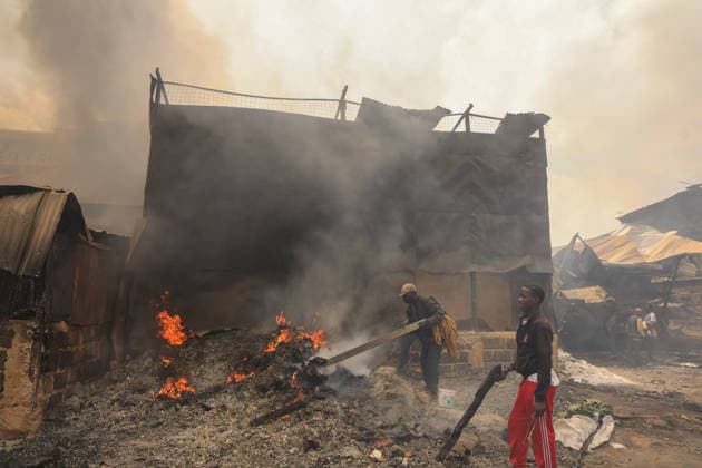 Blaze destroys shops at Nairobi s Gikomba Market NAIROBI, KENYA - JUNE 21: People inspect the damage and try to salvage their belongings after a fire broke out at Gikomba Market in Nairobi, Kenya, on June 21, 2026. Numerous shops were destroyed in the blaze as firefighters worked to contain the fire. Lucas Mukasa Anadolu Nairobi Kenya. Editorial use only. Please get in touch for any other usage.  Copyright: x2026xAnadoluxLucasxMukasax