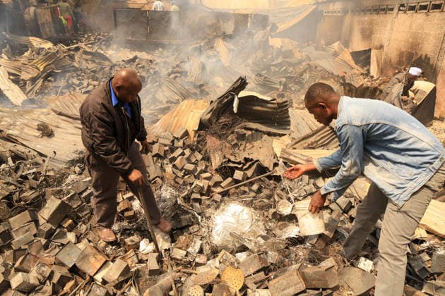 Blaze destroys shops at Nairobi s Gikomba Market NAIROBI, KENYA - JUNE 21: People inspect the damage and try to salvage their belongings after a fire broke out at Gikomba Market in Nairobi, Kenya, on June 21, 2026. Numerous shops were destroyed in the blaze as firefighters worked to contain the fire. Lucas Mukasa Anadolu Nairobi Kenya. Editorial use only. Please get in touch for any other usage.  Copyright: x2026xAnadoluxLucasxMukasax