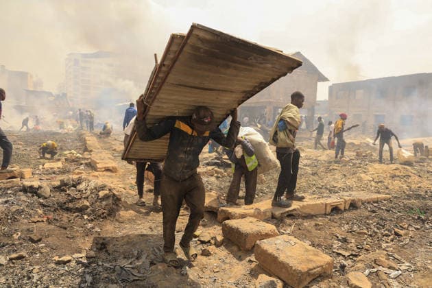 Blaze destroys shops at Nairobi s Gikomba Market NAIROBI, KENYA - JUNE 21: People inspect the damage and try to salvage their belongings after a fire broke out at Gikomba Market in Nairobi, Kenya, on June 21, 2026. Numerous shops were destroyed in the blaze as firefighters worked to contain the fire. Lucas Mukasa Anadolu Nairobi Kenya. Editorial use only. Please get in touch for any other usage.  Copyright: x2026xAnadoluxLucasxMukasax