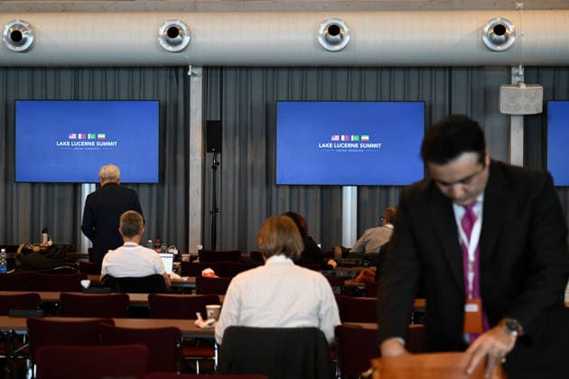(260621) -- BUERGENSTOCK, June 21, 2026 -- Reporters work at the press center in Buergenstock near Lucerne, Switzerland, June 21, 2026. Technical-level talks between the United States and Iran under the Islamabad Memorandum of Understanding (MoU) is held here on Sunday. ) SWITZERLAND-BUERGENSTOCK-U.S.-IRAN TALKS LianxYi 
