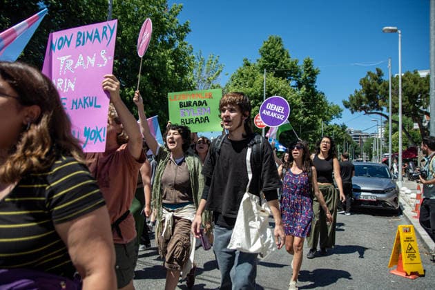 June 21, 2026, Istanbul, Istanbul, Turkey: Activists participate in the 12th Trans Pride March in the Kadikoy district of Istanbul, Turkey, on June 21, 2026. Following the conclusion of the march and after participants had dispersed, police detained several people, including journalists covering the event. The annual march was organized to raise awareness of transgender rights and issues affecting the LGBTQ+ community. Istanbul Turkey - ZUMAt171 20260621_zip_t171_014 Copyright: xAbdullahxTepelix