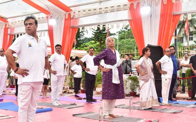 June 21, 2026, Guwahati, Assam, India: Union Finance Minister Nirmala Sitharaman, Assam Chief Minister Himanta Bishwa Sarma, and others participate in a mass yoga session organized on the occasion of International Day of Yoga in Guwahati, India, on June 21, 2026. The International Day of Yoga is a global observance celebrated annually on June 21 to promote the benefits of yoga for physical, mental, and spiritual well-being. Guwahati India - ZUMAa254 20260621_zip_a254_046 Copyright: xHafizxAhmedx