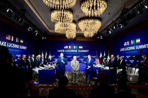 June 21, 2026, Peshawar, Peshawar, Pakistan: Prime Minister Shehbaz Sharif, U.S. Vice President J.D. Vance and Qatari Prime Minister Interact with Media Ahead of U.S.-Iran Talks..Bürgenstock, Switzerland, June 21, 2026 Muhammad Shehbaz Sharif, accompanied by J.D. Vance and Sheikh Mohammed bin Abdulrahman bin Jassim Al Thani, interacts with members of the media prior to the commencement of technical-level talks between the United States and Iran in Bürgenstock on June 21, 2026. The discussions, hosted by Pakistan as part of the implementation process of the Islamabad Memorandum of Understanding, are aimed at advancing diplomatic engagement and regional stability. Peshawar Pakistan - ZUMAa217 20260621_znp_a217_005 Copyright: xHussainxAlix