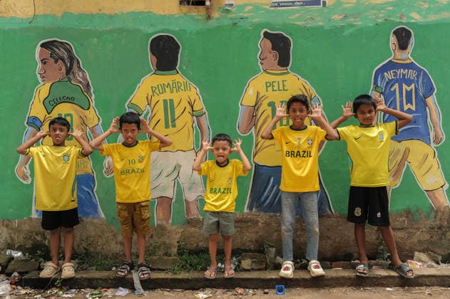 FIFA WORLD CUP 2026 - Brazil Goli (Corridor) in Chattogram, Bangladesh. Chattogram, Bangladesh - Local children, passionate supporters of Brazil s national football team, pose in front of a vibrant mural featuring Brazilian football stars in Brazil Goli (Corridor) at Bahaddarhat Khatib Para. The narrow alley, decorated with Brazilian flags, colors, and football-themed artwork, has become a unique gathering place for football enthusiasts and a symbol of Bangladesh s enduring love for Brazilian football, especially during major international tournaments., Credit:Md Rafayat Haque Khan Mohammed Rafayat Haque Khan Avalon Bangladesh, Chattogram  Copyright: xMdxRafayatxHaquexKhanx xMohammedxRafayatxHaquexKhanx xAvalonx 1111628843