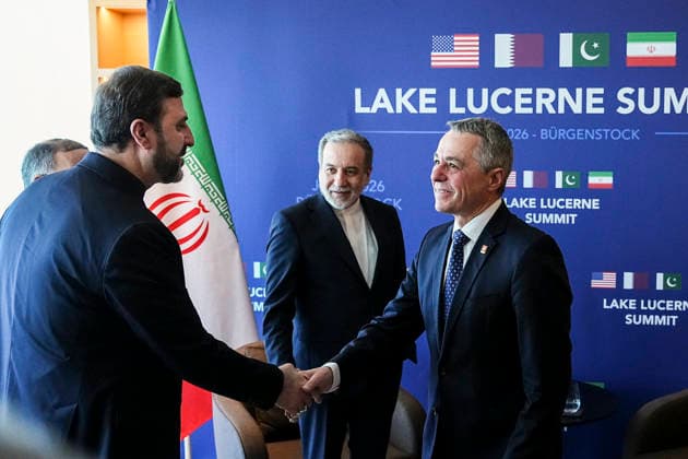 Switzerland Iran-US Talks June 2026 A member of the Iranian delegation shakes hands with a Swiss official during a meeting at the Burgenstock resort in Obburgen, near Lucerne, Switzerland, on June 21, 2025. US and Iranian officials began direct talks in Switzerland after signing an initial agreement last week aimed at ending the war. Zurich Zurich Switzerland Copyright: xHamedxMalekpourx