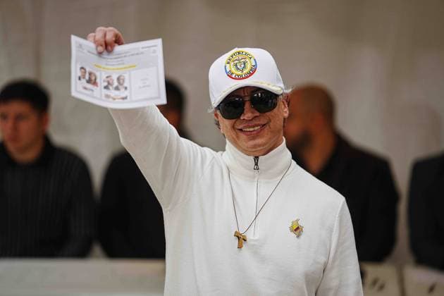 (260622) -- BOGOTA, June 22, 2026 -- Colombian President Gustavo Petro shows his ballot at a polling station in Bogota, Colombia, June 21, 2026. Independent candidate Abelardo De la Espriella, associated with the far-right Defenders of the Homeland movement, led the presidential runoff election on Sunday and is set to become Colombia s next president for the 2026-2030 term, according to preliminary results released by the National Civil Registry. (Photo by Xinhua) COLOMBIA-PRESIDENTIAL RUNOFF ELECTION AndresxMoreno 