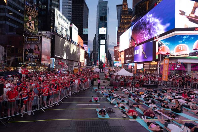 Norway national football team supporters gather in Times Square ahead of World Cup match NEW YORK, UNITED STATES - JUNE 21: A group does yoga as Norwegian national football team supporters gather on the iconic red steps in Times Square ahead of Monday s FIFA World Cup match, creating a festive atmosphere with chants and traditional rowing celebrations as fans dressed in red and waving flags filled the famous Manhattan landmark in New York, United States on June 21, 2026. Lokman Vural Elibol Anadolu New York United States. Editorial use only. Please get in touch for any other usage.  Copyright: x2026xAnadoluxLokmanxVuralxElibolx