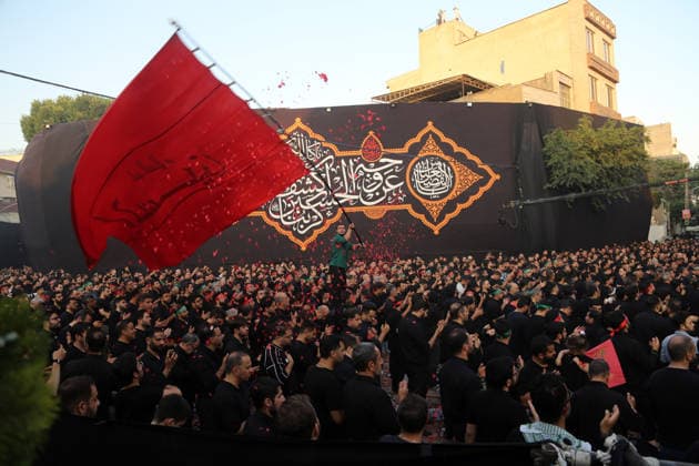 Iranians gather to mark Muharram in Tehran TEHRAN, IRAN - JUNE 22: Shiite Muslims dressed in black wear religious headbands attends a mourning ceremony marking the month of Muharram at the Imamzadeh Ali Akbar Shrine in northern Tehran, Iran on June 22, 2026. Participants gathered to commemorate Hazrat Hussein, the grandson of Prophet Muhammad, and his 72 companions who were martyred in the Battle of Karbala, accompanying the traditional elegies and lamentations. Fatemeh Bahrami Anadolu Tehran Iran. Editorial use only. Please get in touch for any other usage.  Copyright: x2026xAnadoluxFatemehxBahramix