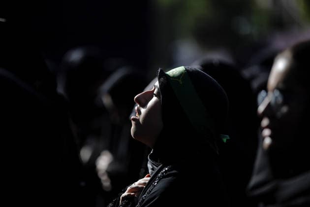 Iranians gather to mark Muharram in Tehran TEHRAN, IRAN - JUNE 22: Shiite Muslims dressed in black wear religious headbands attends a mourning ceremony marking the month of Muharram at the Imamzadeh Ali Akbar Shrine in northern Tehran, Iran on June 22, 2026. Participants gathered to commemorate Hazrat Hussein, the grandson of Prophet Muhammad, and his 72 companions who were martyred in the Battle of Karbala, accompanying the traditional elegies and lamentations. Fatemeh Bahrami Anadolu Tehran Iran. Editorial use only. Please get in touch for any other usage.  Copyright: x2026xAnadoluxFatemehxBahramix
