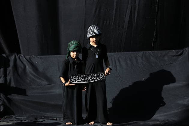 Iranians gather to mark Muharram in Tehran TEHRAN, IRAN - JUNE 22: Shiite Muslims dressed in black wear religious headbands attends a mourning ceremony marking the month of Muharram at the Imamzadeh Ali Akbar Shrine in northern Tehran, Iran on June 22, 2026. Participants gathered to commemorate Hazrat Hussein, the grandson of Prophet Muhammad, and his 72 companions who were martyred in the Battle of Karbala, accompanying the traditional elegies and lamentations. Fatemeh Bahrami Anadolu Tehran Iran. Editorial use only. Please get in touch for any other usage.  Copyright: x2026xAnadoluxFatemehxBahramix