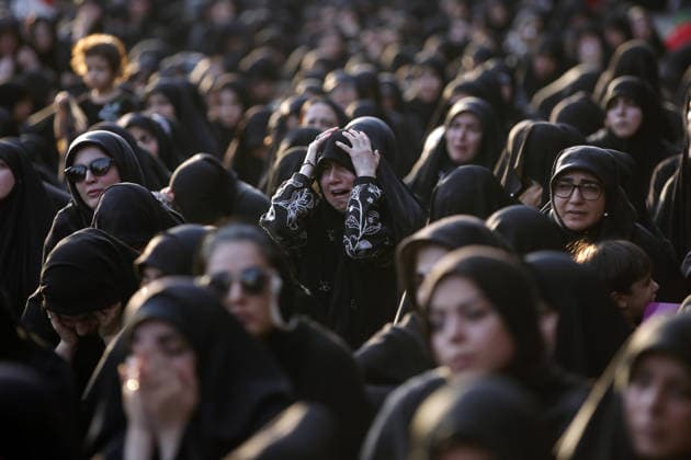 Iranians gather to mark Muharram in Tehran TEHRAN, IRAN - JUNE 22: Shiite Muslims dressed in black wear religious headbands attends a mourning ceremony marking the month of Muharram at the Imamzadeh Ali Akbar Shrine in northern Tehran, Iran on June 22, 2026. Participants gathered to commemorate Hazrat Hussein, the grandson of Prophet Muhammad, and his 72 companions who were martyred in the Battle of Karbala, accompanying the traditional elegies and lamentations. Fatemeh Bahrami Anadolu Tehran Iran. Editorial use only. Please get in touch for any other usage.  Copyright: x2026xAnadoluxFatemehxBahramix