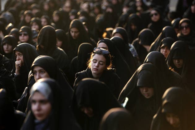 Iranians gather to mark Muharram in Tehran TEHRAN, IRAN - JUNE 22: Shiite Muslims dressed in black wear religious headbands attends a mourning ceremony marking the month of Muharram at the Imamzadeh Ali Akbar Shrine in northern Tehran, Iran on June 22, 2026. Participants gathered to commemorate Hazrat Hussein, the grandson of Prophet Muhammad, and his 72 companions who were martyred in the Battle of Karbala, accompanying the traditional elegies and lamentations. Fatemeh Bahrami Anadolu Tehran Iran. Editorial use only. Please get in touch for any other usage.  Copyright: x2026xAnadoluxFatemehxBahramix