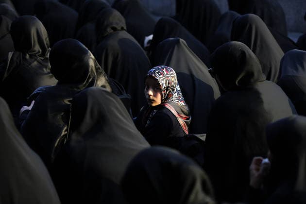 Iranians gather to mark Muharram in Tehran TEHRAN, IRAN - JUNE 22: Shiite Muslims dressed in black wear religious headbands attends a mourning ceremony marking the month of Muharram at the Imamzadeh Ali Akbar Shrine in northern Tehran, Iran on June 22, 2026. Participants gathered to commemorate Hazrat Hussein, the grandson of Prophet Muhammad, and his 72 companions who were martyred in the Battle of Karbala, accompanying the traditional elegies and lamentations. Fatemeh Bahrami Anadolu Tehran Iran. Editorial use only. Please get in touch for any other usage.  Copyright: x2026xAnadoluxFatemehxBahramix