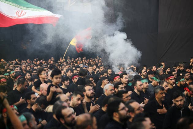 Iranians gather to mark Muharram in Tehran TEHRAN, IRAN - JUNE 22: Shiite Muslims dressed in black wear religious headbands attends a mourning ceremony marking the month of Muharram at the Imamzadeh Ali Akbar Shrine in northern Tehran, Iran on June 22, 2026. Participants gathered to commemorate Hazrat Hussein, the grandson of Prophet Muhammad, and his 72 companions who were martyred in the Battle of Karbala, accompanying the traditional elegies and lamentations. Fatemeh Bahrami Anadolu Tehran Iran. Editorial use only. Please get in touch for any other usage.  Copyright: x2026xAnadoluxFatemehxBahramix