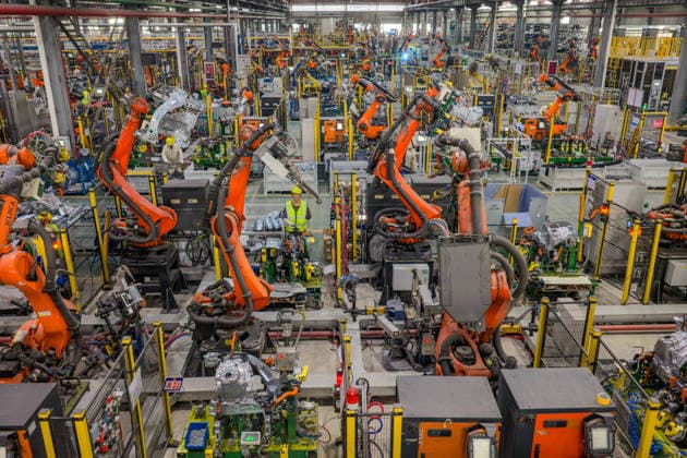 JINHUA, CHINA - JUNE 22: Industrial robots work on the production line at the workshop of new energy vehicle components enterprise on June 22, 2026 in Jinhua, Zhejiang Province of China.  Copyright: xVCGx 111649698760