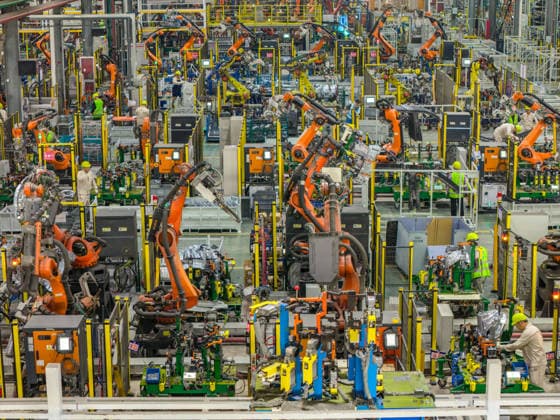 JINHUA, CHINA - JUNE 22: Industrial robots work on the production line at the workshop of new energy vehicle components enterprise on June 22, 2026 in Jinhua, Zhejiang Province of China.  Copyright: xVCGx 111649698752