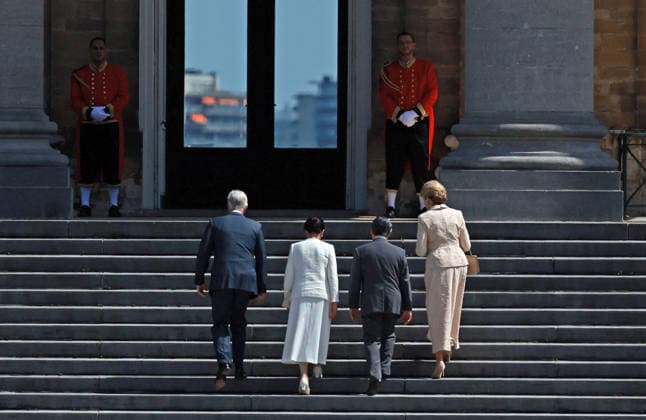 Japan emperor, empress in Brussels (From L) Belgian King Philippe, Japanese Empress Masako, Japanese Emperor Naruhito and Belgian Queen Mathilde head to the Palace of Laeken in Brussels on June 22, 2026. (Pool photo)  A14AA0005619827P