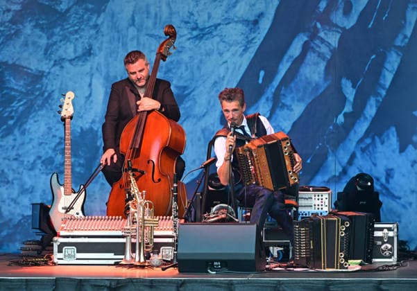 Open-air concert by the Herbert Pixner Project on the Toscana Peninsula in Gmunden, photographed on June 22, 2026. The photo shows bandleader and accordionist Herbert Pixner and bassist Werner Unterlerchner at the 2022 open-air concert by the Herbert Pixner Project on the Toscana Peninsula in Gmunden, on June 22, 2026,detected_source_language