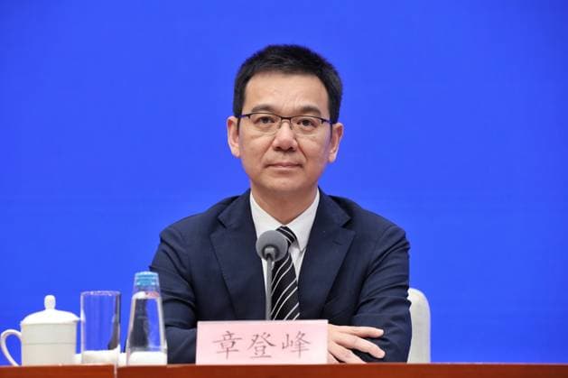 BEIJING, CHINA - JUNE 23: Zhang Dengfeng, member of the Standing Committee of the Hangzhou Municipal Party Committee and Vice Mayor of Hangzhou, attends a press conference held by the State Council Information Office on June 23, 2026 in Beijing, China. The conference featured officials from the Ministry of Commerce, Ministry of Industry and Information Technology, Ministry of Culture and Tourism, as well as representatives from Hangzhou and Chengdu, to discuss measures for expanding automobile consumption across the entire chain.  Copyright: xVCGx 111649912529