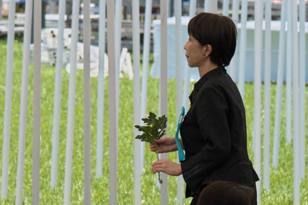 Japan s Prime Minister Sanae Takaichi offers flowers during the memorial service for all war dead of Battle of Okinawa at the Peace Memorial Park in Itoman, Okinawa-Prefecture, Japan on Tuesday, June 23, 2026.  TKP2026062311 KEIZOxMORI