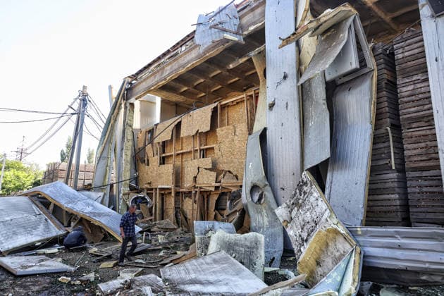 RECORD DATE NOT STATED The aftermath of a Russian missile strike on an agricultural enterprise in Odesa region, Ukraine, on June 21, 2026. Late on June 21, Russian forces launched an Iskander ballistic missile strike on a civilian agricultural enterprise, completely destroying a warehouse building and damaging the facade of a two-story building and agricultural machinery. One person was killed and three others were injured and hospitalized (Photo by Nina Liashonok Ukrinform) Agricultural enterprise hit by Russian strike in Odesa region  Copyright: xNinaxLiashonokx